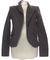 La garantie Once Again : 456604 vêtements d'occasion de marque en état irréprochable.