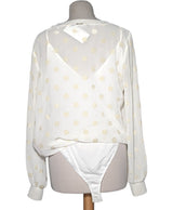531063 Tops et t-shirts GUESS Occasion Vêtement occasion seconde main
