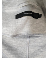 La garantie Once Again : 540524 vêtements d'occasion de marque en état irréprochable.