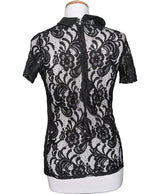 La garantie Once Again : 540556 vêtements d'occasion de marque en état irréprochable.