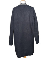 La garantie Once Again : 542520 vêtements d'occasion de marque en état irréprochable.