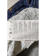 La garantie Once Again : 542564 vêtements d'occasion de marque en état irréprochable.