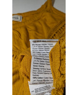 La garantie Once Again : 542571 vêtements d'occasion de marque en état irréprochable.