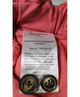 La garantie Once Again : 544510 vêtements d'occasion de marque en état irréprochable.