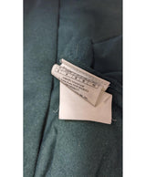 La garantie Once Again : 546612 vêtements d'occasion de marque en état irréprochable.