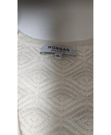 La garantie Once Again : 546670 vêtements d'occasion de marque en état irréprochable.