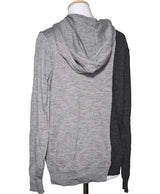 La garantie Once Again : 548648 vêtements d'occasion de marque en état irréprochable.