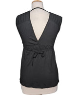 548758 Tops et t-shirts GUESS Occasion Vêtement occasion seconde main