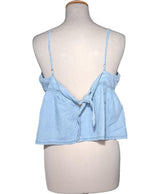 551043 Tops et t-shirts MANGO Occasion Vêtement occasion seconde main