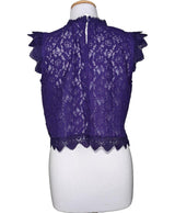 La garantie Once Again : 554551 vêtements d'occasion de marque en état irréprochable.
