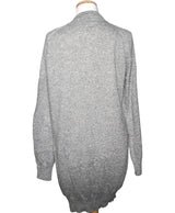La garantie Once Again : 554635 vêtements d'occasion de marque en état irréprochable.