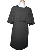 La garantie Once Again : 556534 vêtements d'occasion de marque en état irréprochable.