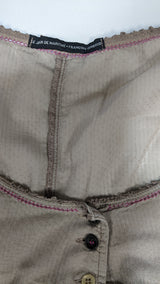 La garantie Once Again : 556559 vêtements d'occasion de marque en état irréprochable.