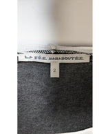 La garantie Once Again : 558265 vêtements d'occasion de marque en état irréprochable.