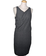 La garantie Once Again : 558321 vêtements d'occasion de marque en état irréprochable.