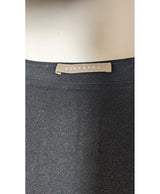 La garantie Once Again : 558426 vêtements d'occasion de marque en état irréprochable.