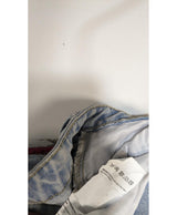 La garantie Once Again : 558616 vêtements d'occasion de marque en état irréprochable.