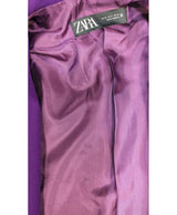 La garantie Once Again : 558625 vêtements d'occasion de marque en état irréprochable.