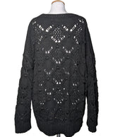 La garantie Once Again : 560089 vêtements d'occasion de marque en état irréprochable.