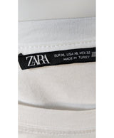 La garantie Once Again : 560094 vêtements d'occasion de marque en état irréprochable.