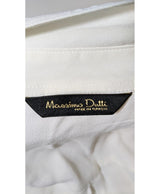 La garantie Once Again : 560188 vêtements d'occasion de marque en état irréprochable.