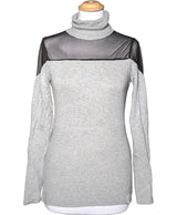 La garantie Once Again : 560290 vêtements d'occasion de marque en état irréprochable.