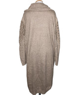 La garantie Once Again : 560308 vêtements d'occasion de marque en état irréprochable.