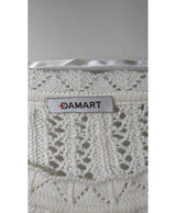 La garantie Once Again : 560404 vêtements d'occasion de marque en état irréprochable.