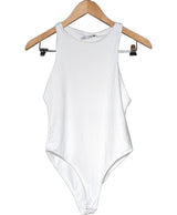 La garantie Once Again : 560440 vêtements d'occasion de marque en état irréprochable.