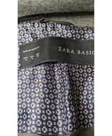 La garantie Once Again : 560479 vêtements d'occasion de marque en état irréprochable.