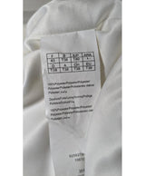 La garantie Once Again : 560504 vêtements d'occasion de marque en état irréprochable.