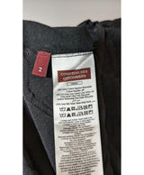 La garantie Once Again : 560555 vêtements d'occasion de marque en état irréprochable.