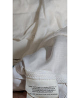 La garantie Once Again : 560729 vêtements d'occasion de marque en état irréprochable.