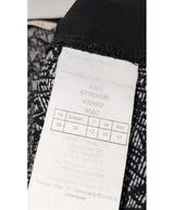 La garantie Once Again : 560837 vêtements d'occasion de marque en état irréprochable.