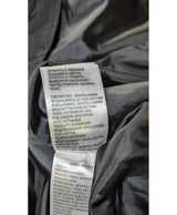 La garantie Once Again : 560872 vêtements d'occasion de marque en état irréprochable.