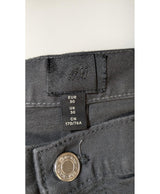 La garantie Once Again : 560886 vêtements d'occasion de marque en état irréprochable.