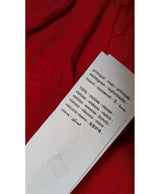 La garantie Once Again : 560939 vêtements d'occasion de marque en état irréprochable.