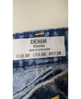 La garantie Once Again : 560964 vêtements d'occasion de marque en état irréprochable.