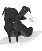 La garantie Once Again : 560973 vêtements d'occasion de marque en état irréprochable.