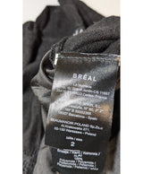 La garantie Once Again : 560983 vêtements d'occasion de marque en état irréprochable.