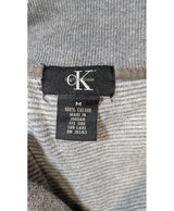 La garantie Once Again : 561100 vêtements d'occasion de marque en état irréprochable.