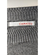 La garantie Once Again : 561125 vêtements d'occasion de marque en état irréprochable.