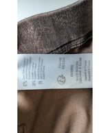 La garantie Once Again : 561161 vêtements d'occasion de marque en état irréprochable.