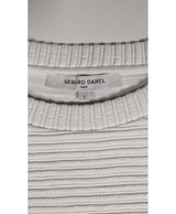 La garantie Once Again : 561689 vêtements d'occasion de marque en état irréprochable.