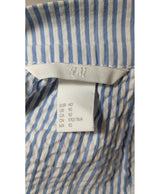 La garantie Once Again : 561905 vêtements d'occasion de marque en état irréprochable.