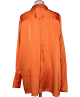 La garantie Once Again : 562037 vêtements d'occasion de marque en état irréprochable.