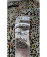 La garantie Once Again : 562086 vêtements d'occasion de marque en état irréprochable.