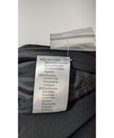 La garantie Once Again : 562159 vêtements d'occasion de marque en état irréprochable.