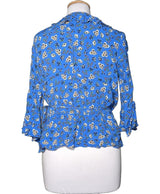 La garantie Once Again : 562274 vêtements d'occasion de marque en état irréprochable.