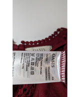 La garantie Once Again : 562394 vêtements d'occasion de marque en état irréprochable.